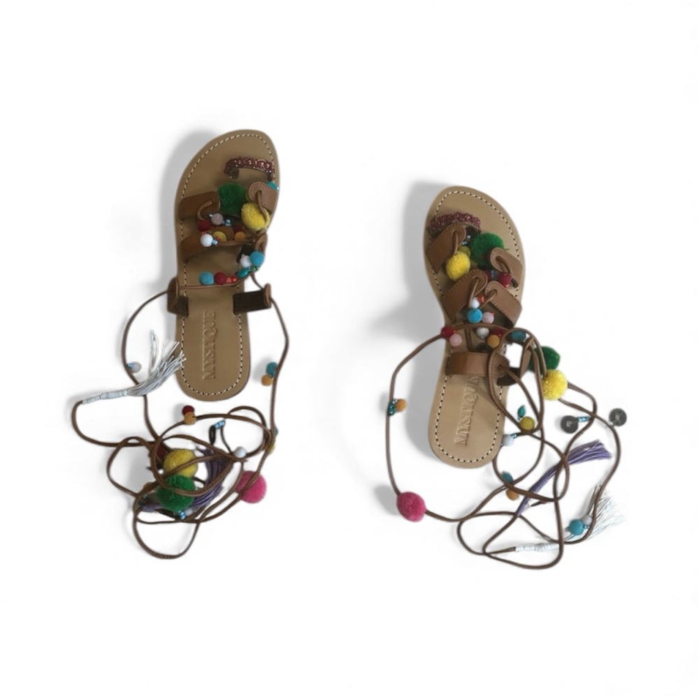 Mystique Boutique Pom Pom gladiator sandals. NWOT and comes with bag